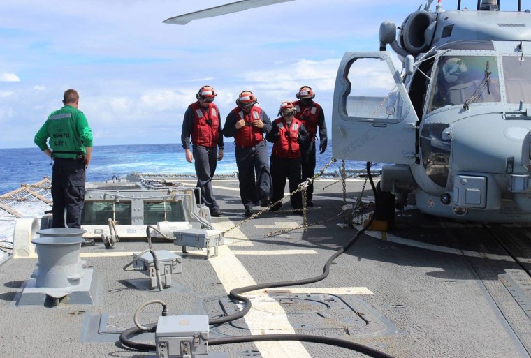 Image: USS Kidd sailors expand roles for round-the-clock MH370 search
