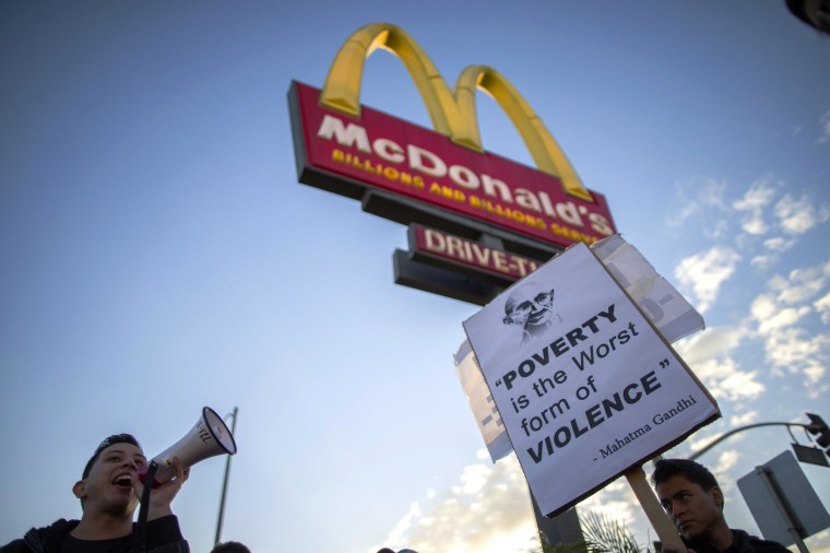 Image: Protesters march outside McDonald's in Los Angeles