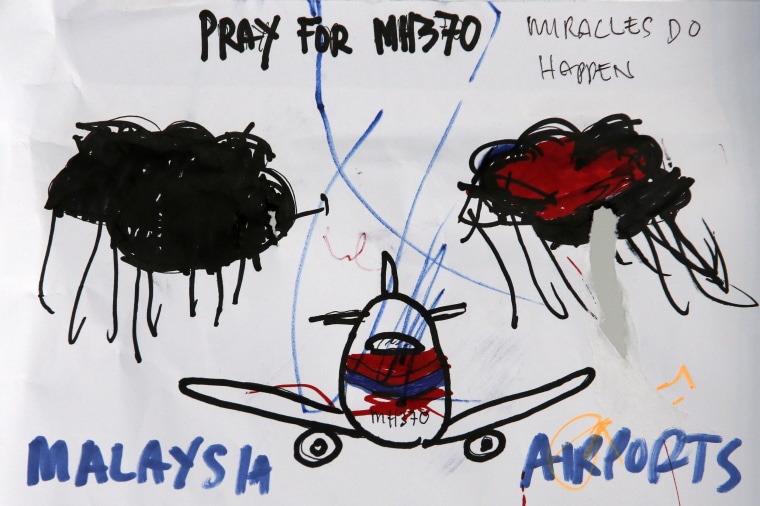 Image: An artwork conveying well-wishes for missing Malaysia Airlines Flight MH370 is seen in Kuala Lumpur International Airport