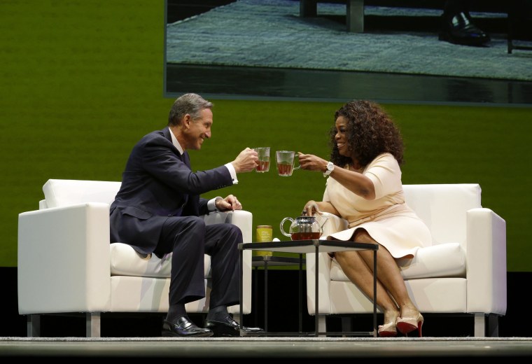 Image: Howard Schultz and Oprah Winfrey announce "Oprah Chai" in Seattle.