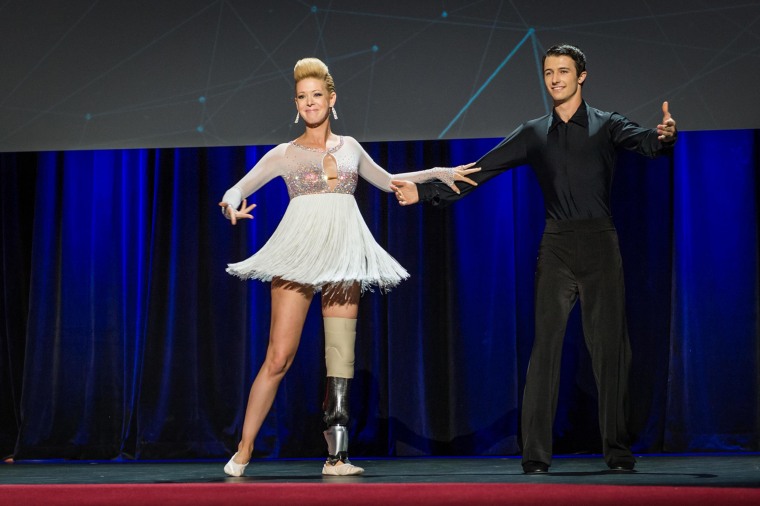 Image: Boston Marathon bombing survivor Adrianne Haslet-Davis and Christian Lightner dance at the international TED 2014 conference at the  Vancouver Convention Center