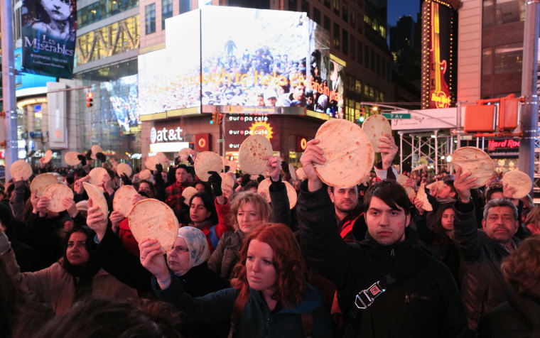Image: About 75 participants assembled in Times Square on Thursday evening to support the people of Yarmouk