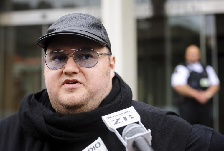 Image: Megaupload founder Dotcom talks to members of the media outside the New Zealand Court of Appeals in Wellington