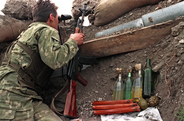 Image: A Russian soldier loyal to the Russian-speaking separatists of the Trans-Dniester republic in 1992