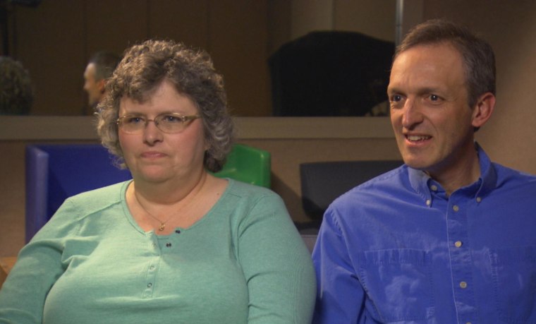 Image: Adoptive parents Shelli and John Giess