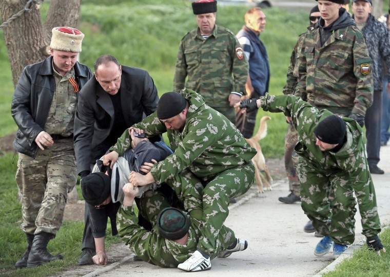 Image: Russian special force storm the last Ukrainian military base in Belbek