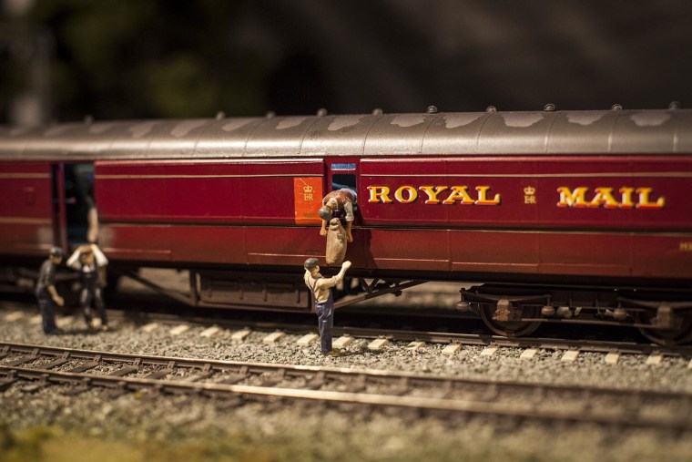 Image: A model railway set depicts the Great Train Robbery in 1963