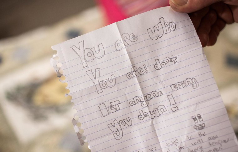 Image: Karen Scot shows a note from one of her students