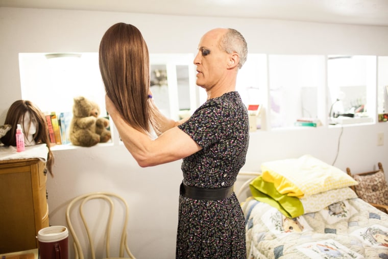 Image: Karen Scot prepares her wig before her first day teaching as a transgendered woman