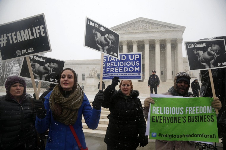 Demonstrators in front of the Supreme Court on Tuesday.