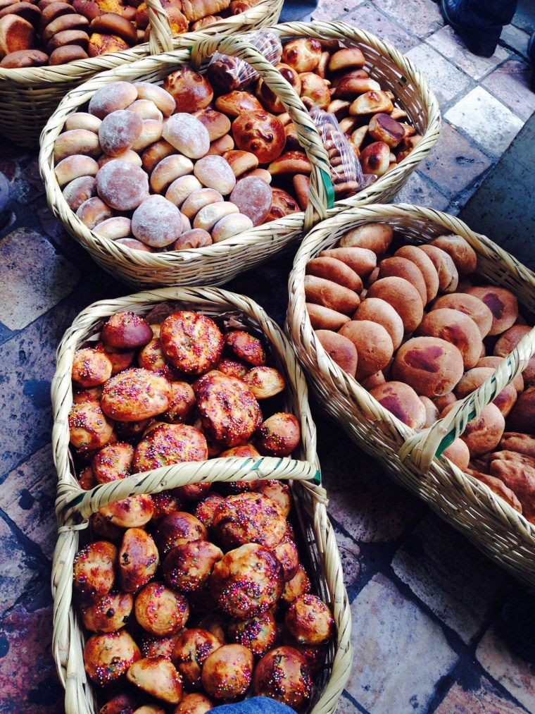 Life is sweet in Cuenca, Ecuador. A basket of fresh bread is for sale in the local market.