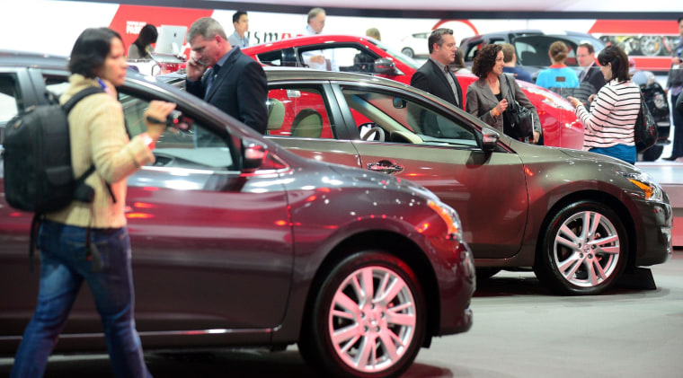 The 2014 Nissan Sentra and Altima are displayed in this Nov. 21, 2013 file photo at the LA Auto Show.