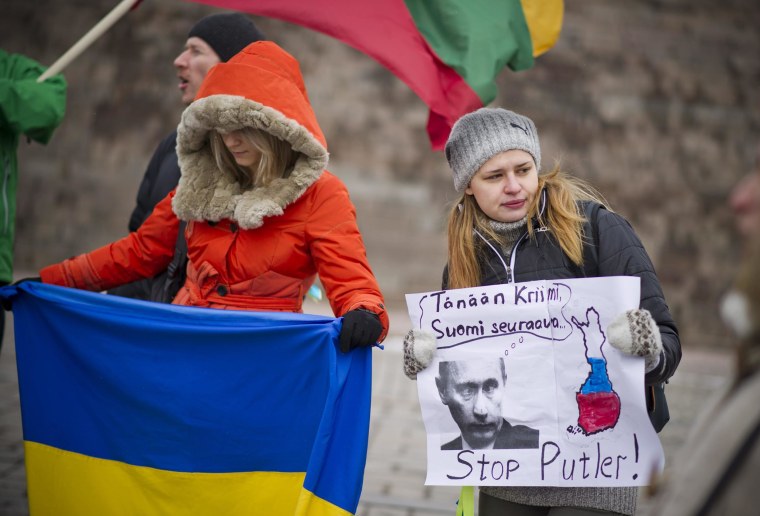 Image: Ukrainians living in Finland stage a demonstration against the Russian invasion and the Crimean referendum