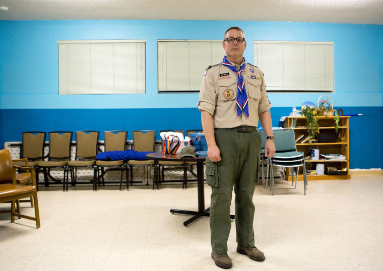 Scoutmaster Geoff McGrath poses for a portrait after a troop meeting at Rainier Beach United Methodist Church in Seattle, Wash., on March 27, 2014.