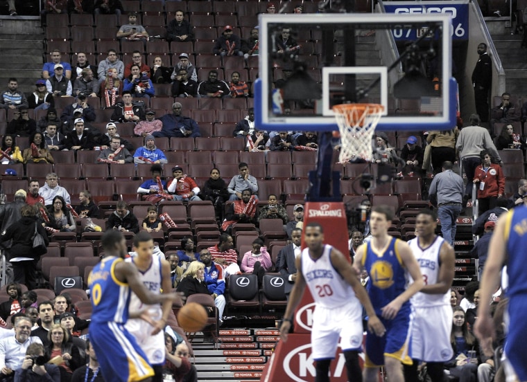 Image: Empty seats are seen during an NBA basketball game