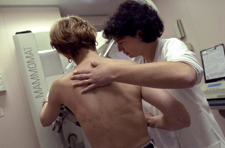 Image: A nurse performs a mammogram.