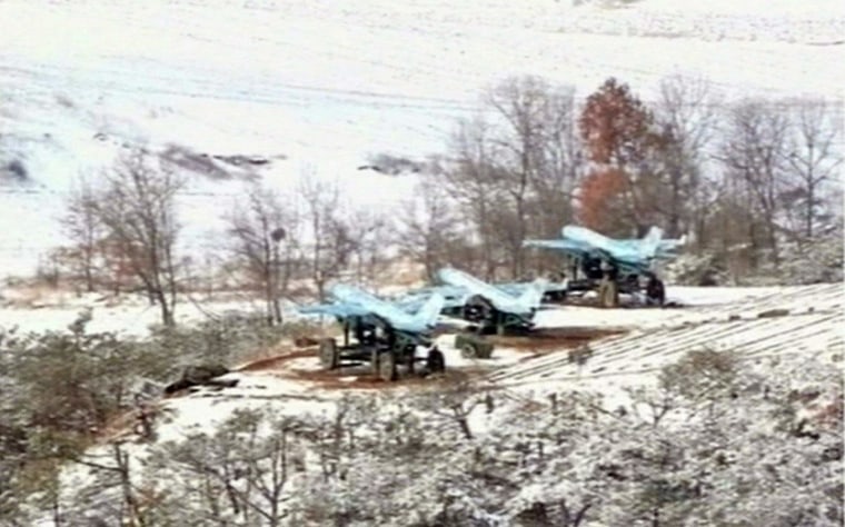 Image: North Korean TV shows drone planes during a drill in March 2013.