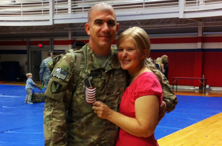 Army Maj. John Considine with his wife, Marily, on Feb. 4, the day he returned from Afghanistan to Fort Hood.
