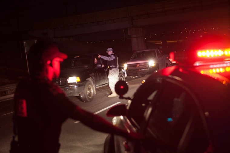 Image: Police direct traffic outside the Bernie Beck Gate