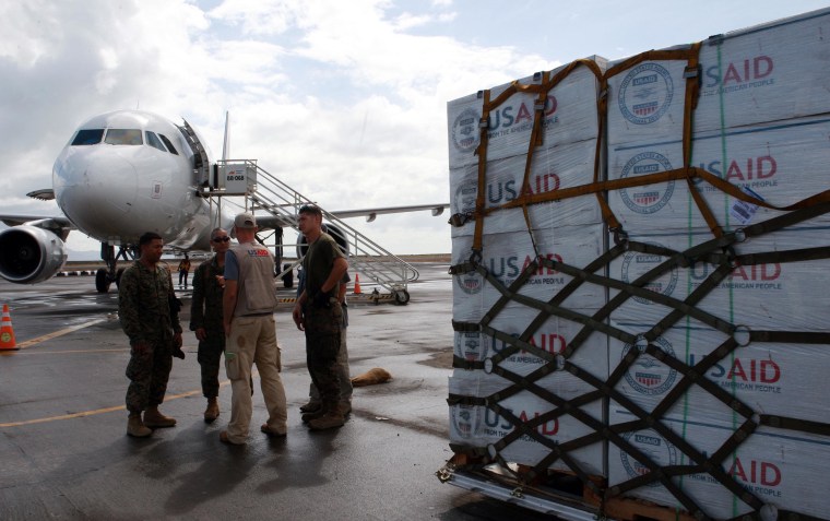 Image: Food aid from USAID arrives at the airport following the super typhoon in the Philippines