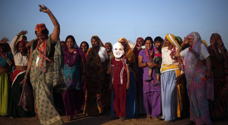 Image: Supporters of Hindu nationalist Modi chant slogans as they leave after attending a rally in Gurgaon
