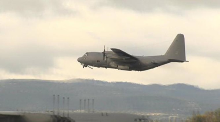 An MC-130P "Combat Shadow" aircraft leaves California National Guard 129th Rescue Wing at Moffett Field to help a San Diego family whose daughter is suffering from salmonella on a boat in the Pacific.