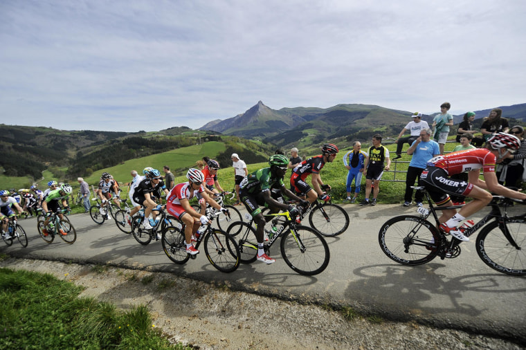 Image: Cyclists climb the Lazkaomendi hill during the first stage of the Tour of the Basque Country in Lazkao, Spain, on Monday.