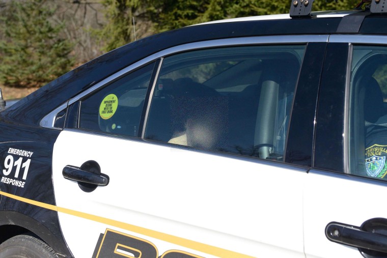A suspect in the Franklin Regional High School stabbings leaves the Murrysville Police Station on Wednesday. Image blurred to protect identity.