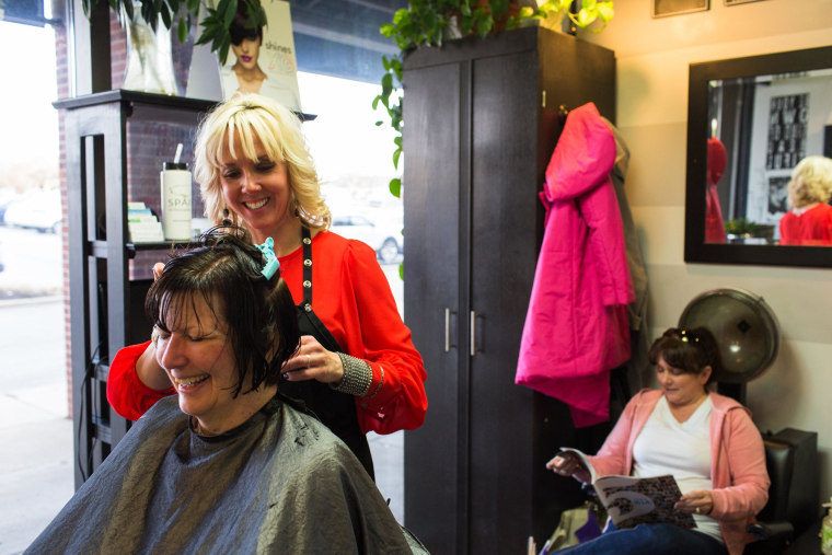 Image: Cathy Tiffany works in her loft at Salon Lofts. 