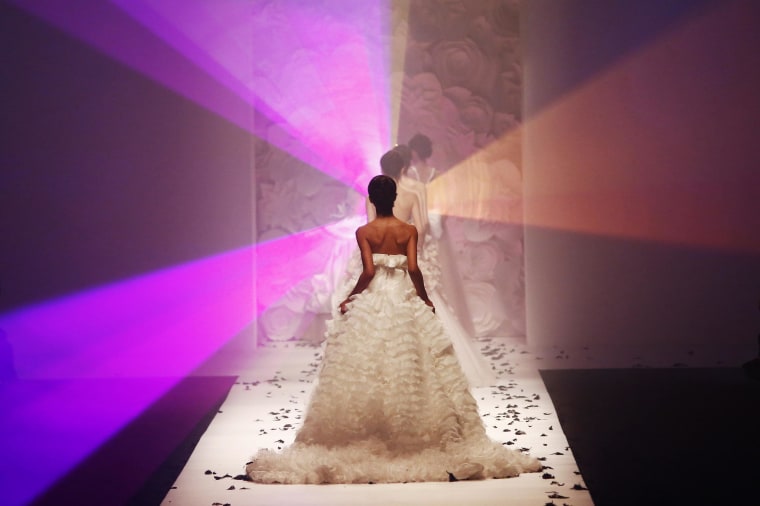 Image: Models present creations by Fanny's F.UR during Shanghai Fashion Week