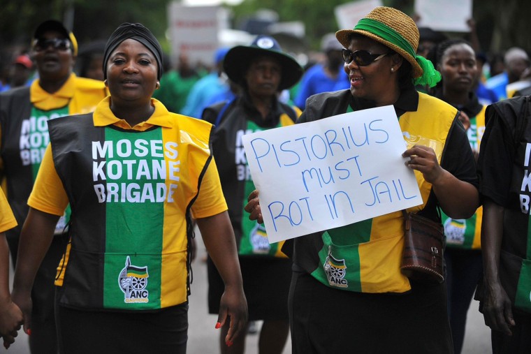 Image: Members of the ruling ANC Women's League march in Pretoria on the anniversary of the killing of Reeva Steenkamp