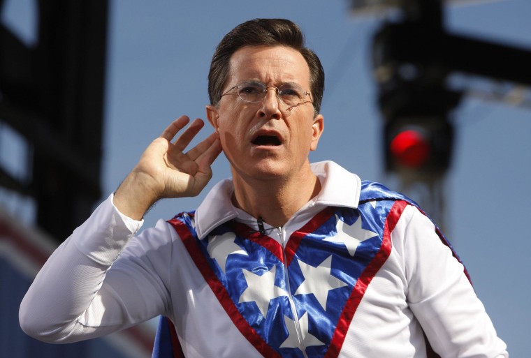 Image: File photo of Comedian Stephen Colbert gestures during the \"Rally to Restore Sanity and/or Fear\" on the National Mall in Washington