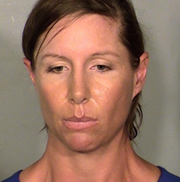 Booking photo of Alison Ernst, who was arrested for throwing a shoe at former Secretary of State Hillary Clinton.