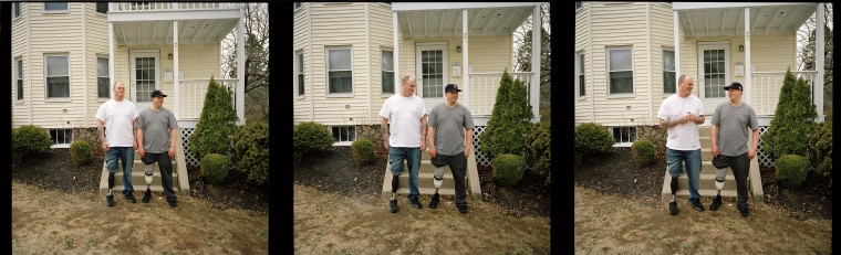 In this series of three images, Boston Marathon bombing survivors Paul, left, and J.P. Norden pose for a portrait outside their home in Stoneham, Mass., on April 7, 2014, a week before the one-year anniversary the terrorist attack in which both lost a right leg. 