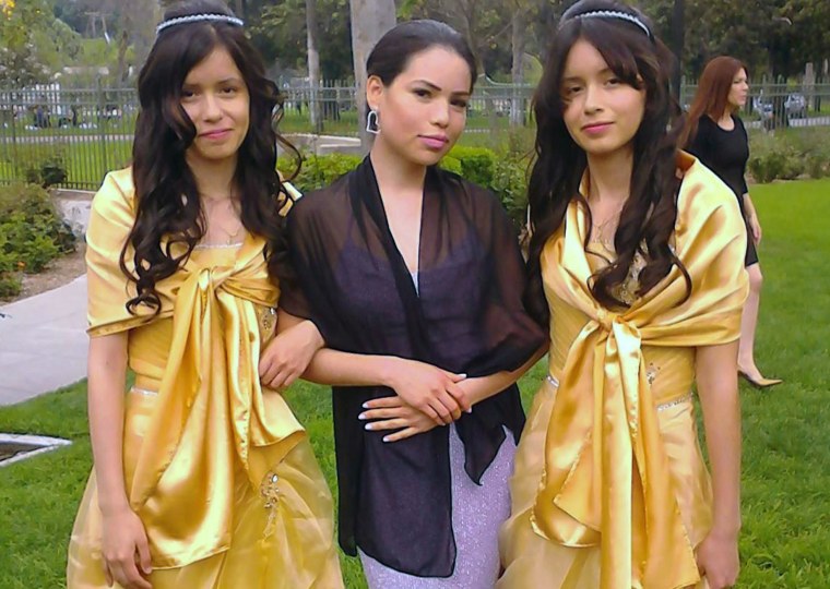 This 2013 photo provided by Miguel Serrato shows twin sisters Marisol Serrato, 17, left, and Marisa Serrato, right, with their sister-in-law Ivette Serrato during a wedding in Riverside, Caif.