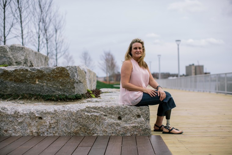 Roseann Sdoia poses for a portrait in front of the Spaulding Rehabilitation Hospital in Boston, Mass., Monday, April 14, 2014. Roseann lost her right leg above the knee when the second bomb went off at the Boston Marathon a year ago on April 15.

