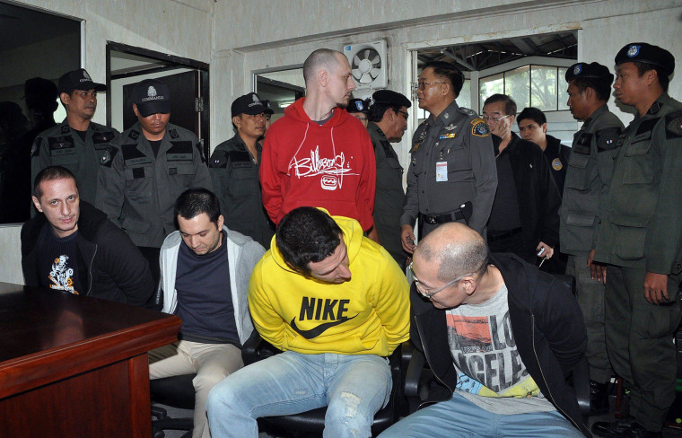 Image: Men suspected of smuggling methamphetamines from North Korea
