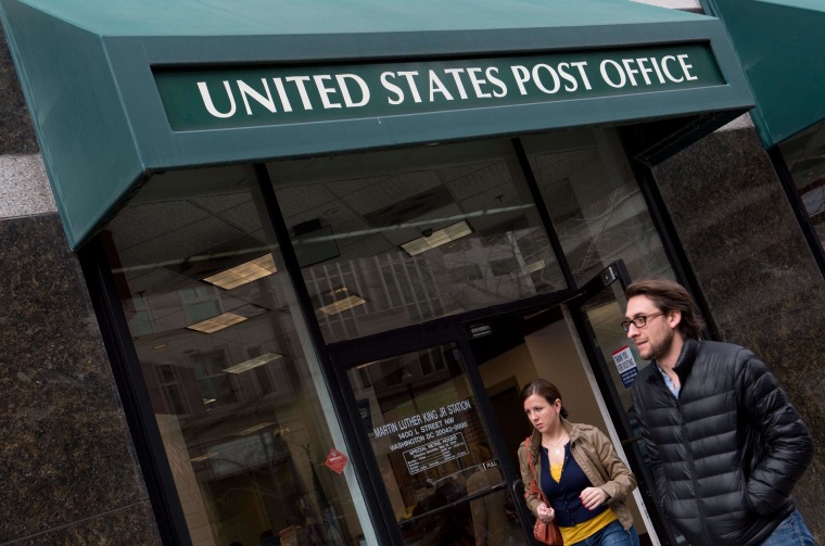 As more Americans file their tax returns electronically, fewer post offices are staying open later on April 15 for snail-mail filers.