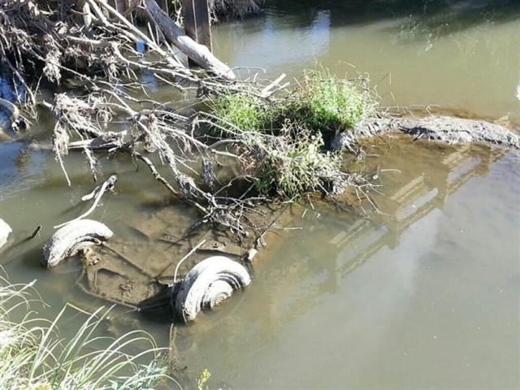 IMAGE: Submerged car found in South Dakota creek