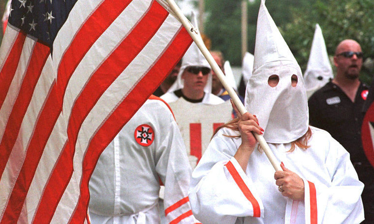 Image: Members of the Church of the American Knights of the Ku Klux Klan march 