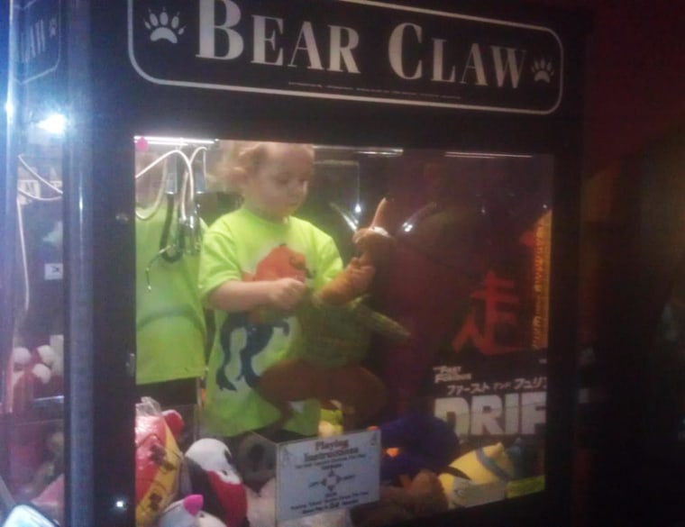 Image: A 3-year-old boy managed to crawl up into a claw machine in Lincoln, Neb.
