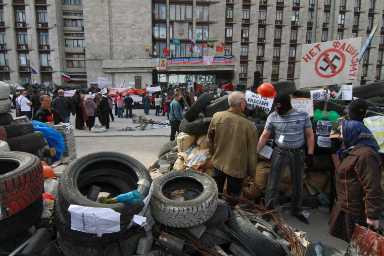 Image: Pro-Russian protesters attend near occupied regional building in Donetsk on Wednesday