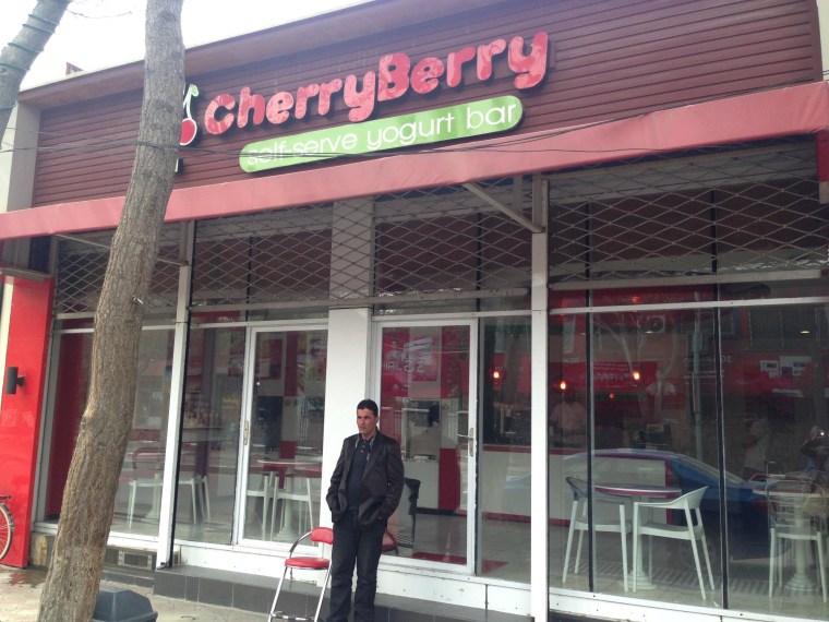 CherryBerry in Kabul is so popular that an unarmed bouncer of sorts stands outside on April 18, 2014 to provide security. Kabul's one and only frozen yogurt outlet was quiet during prayer time on Friday afternoon, but the owners said they anticipated big crowds once prayers were over.