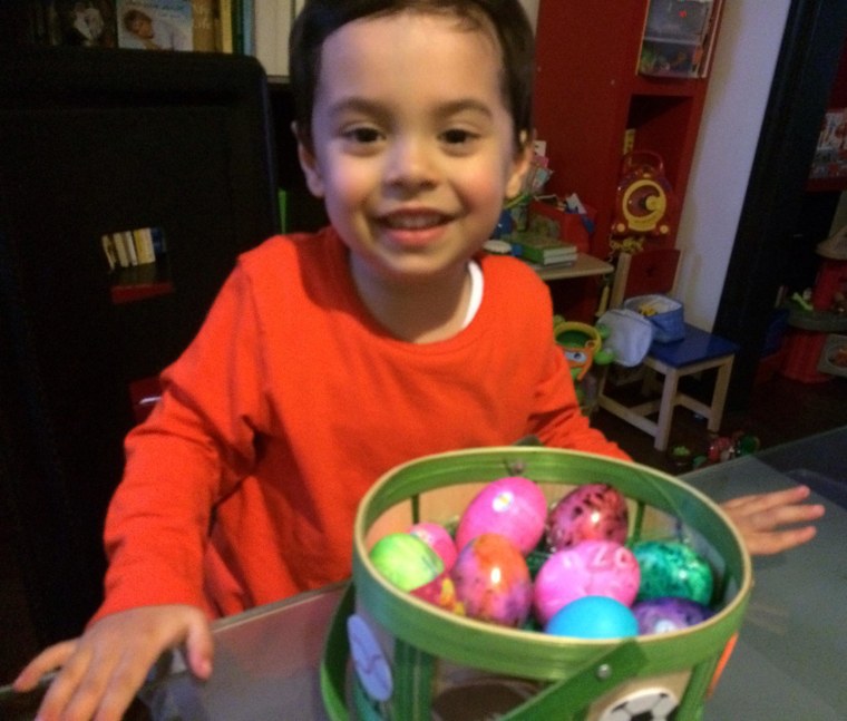 Image: Diana Limongi's son Enzo coloring eggs for the Easter holiday