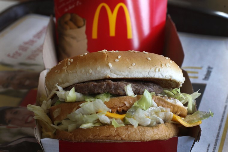 McDonald's posted a lower quarterly profit on Tuesday as high beef costs bit into margins and fewer customer visits resulted in a bigger-than-expected decline in sales.