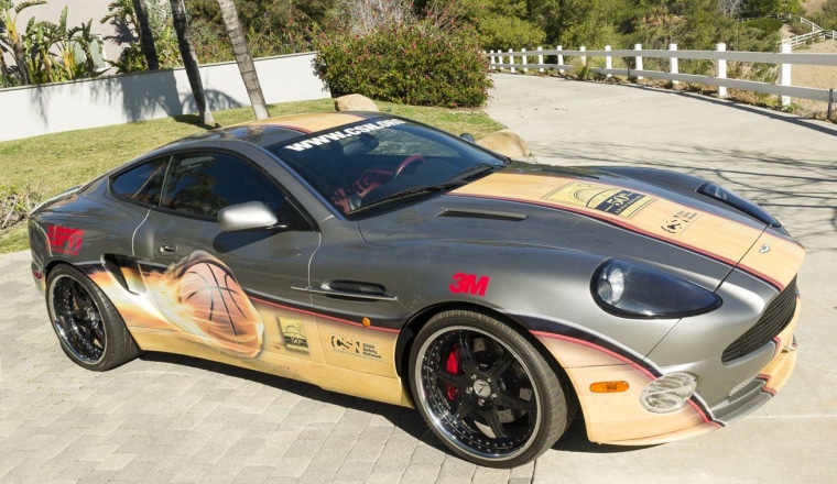 This 2002 Aston Martin Vanquish features the signatures of 50 basketball Hall of Famers.
