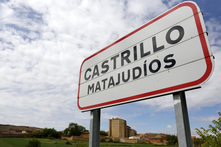 Image: The road sign at the entrance of the small Spanish town of Castrillo Matajudios
