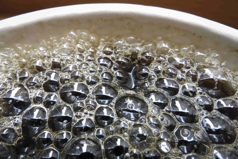 Image: Bubbles form on the surface of a cup of coffee in a cafe in New York