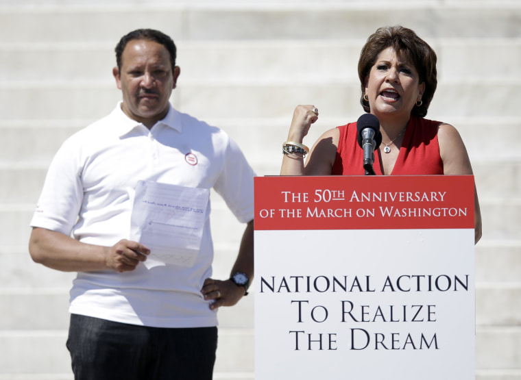 Janet Murguia, president of the National Council of La Raza, speaks as National Urban League president Marc Morial listens, at a rally to commemorate the 50th anniversary of the 1963 March on Washington on the steps of the Lincoln Memorial on Saturday, Aug. 24, 2013, in Washington. The National Council of La Raza evolved as different groups coalesced to form a national "Hispanic" organization. 