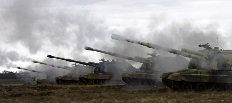 Image: Russian Msta-S self-propelled howitzers fire during military exercises